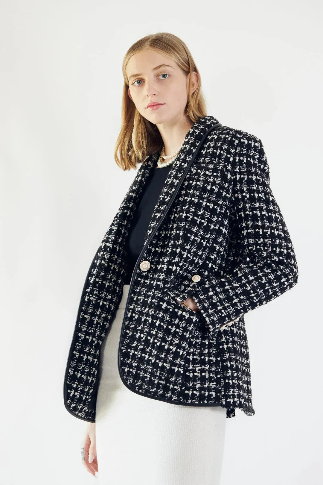 Sophisticated Black and White Tweed Blazer with Luxurious Pearl Details