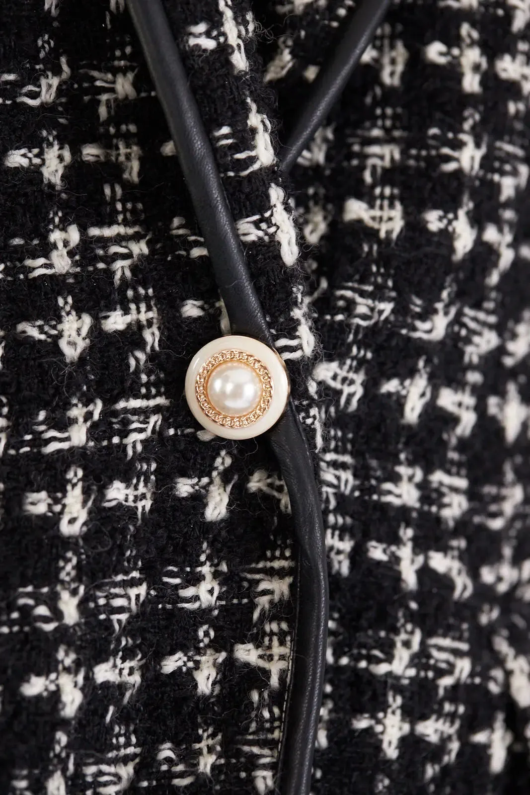 Sophisticated Black and White Tweed Blazer with Luxurious Pearl Details