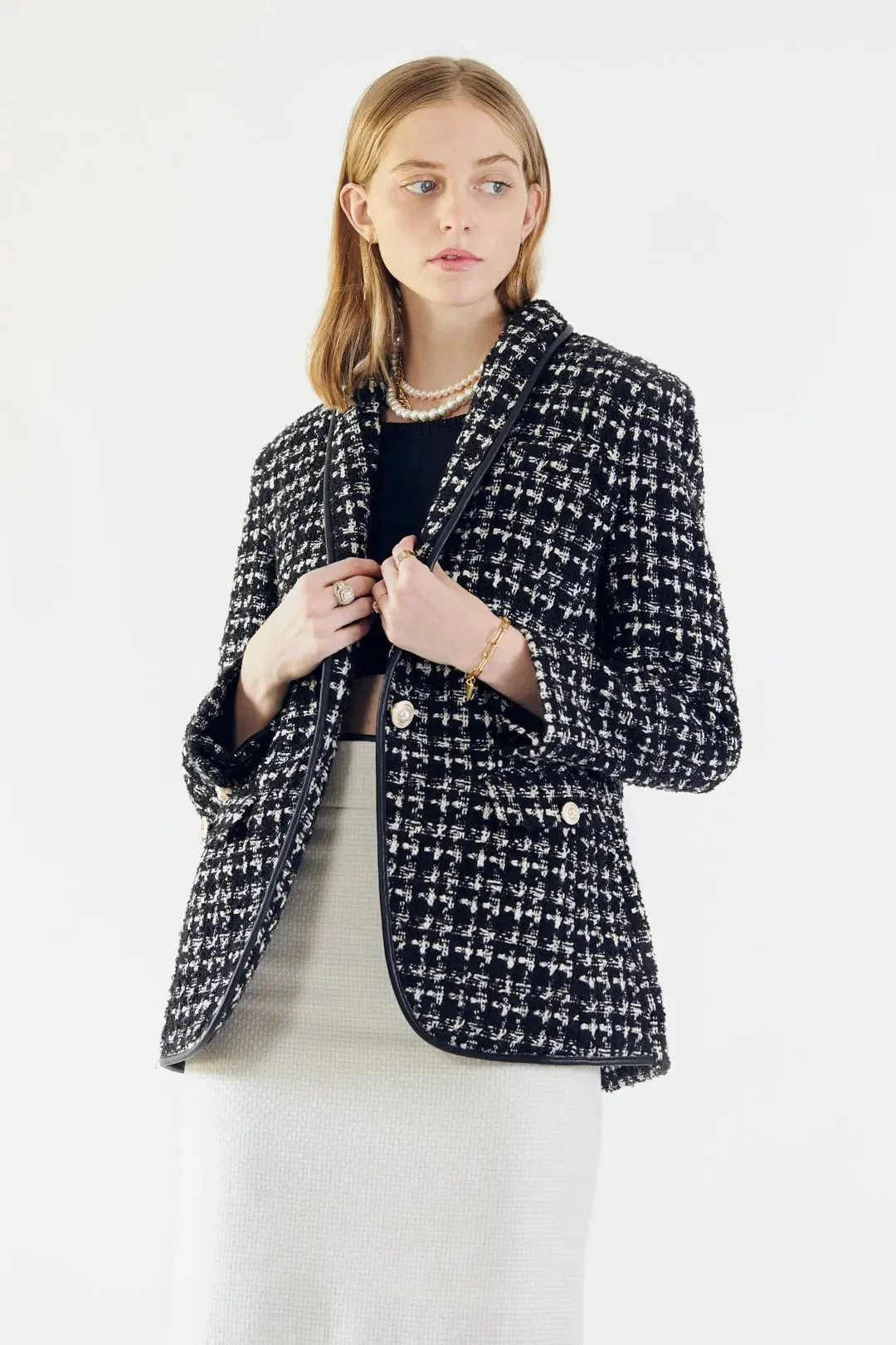 Sophisticated Black and White Tweed Blazer with Luxurious Pearl Details
